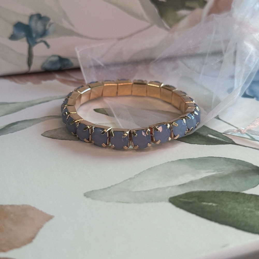 Gold and Blue Gemstone Bracelet with Timeless Elegance